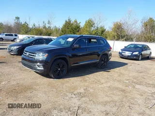 2018 Volkswagen Atlas SEL Premium with VIN 1V2NR2CA0JC589853, listed as a IAAI auction lot 41399169 with 103,513 mi miles and . Bid and sale history available at DreamBid. Image 2.