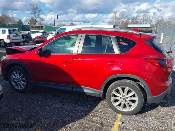 2014 Mazda CX-5 Grand Touring with VIN JM3KE2DY8E0373064, listed as a IAAI auction lot 41683791 with 186,970 mi miles. Bid and sale history available at carsss.com. Image 14.