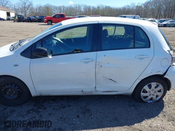 2009 Toyota Yaris with VIN JTDKT903X95244723, listed as a IAAI auction lot 41906848 with Not Provided miles. Bid and sale history available at carsss.com. Image 6.