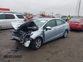 2018 Chevrolet Cruze LS with VIN 1G1BC5SMXJ7197516, listed as a IAAI auction lot 41033980 with 124,058 mi miles and . Bid and sale history available at DreamBid. Image 2.