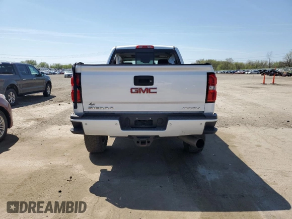 2019 GMC Sierra 2500HD Denali z VIN 1GT12SEY2KF106040, wystawiony jako Copart lot #54123885 z przebiegiem 153 684 mil mil oraz Szkoda całkowita • Salvage title. Historia ofert i sprzedaży dostępna na DreamBid. Obrazek 6.