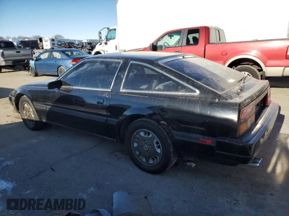 1984 Nissan 300ZX GS with VIN JN1HZ16S0EX003375, listed as a Copart auction lot 44818475 with 298,159 mi miles and Salvage Title. Bid and sale history available at DreamBid. Image 2.