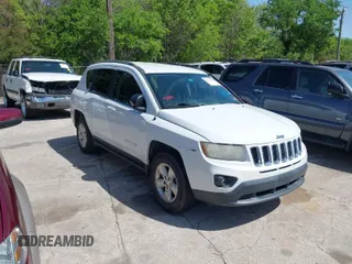 2014 Jeep Compass Sport with VIN 1C4NJCBA3ED882534, listed as a IAAI auction lot 42015557 with 230,937 mi miles. Bid and sale history available at carsss.com. Image 1.