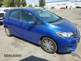 2015 Honda Fit LX with VIN 3HGGK5H53FM718378, listed as a Copart auction lot 52035245 with 104,786 mi miles and Salvage Title. Bid and sale history available at carsss.com. Image 4.