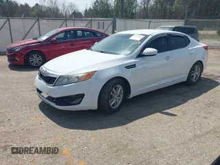 2012 Kia Optima LX with VIN 5XXGM4A77CG050600, listed as a IAAI auction lot 41875841 with 294,134 mi miles and . Bid and sale history available at carsss.com. Image 2.