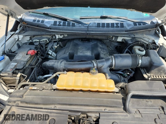 2017 Ford F-150 XL with VIN 1FTEW1EGXHKD51885, listed as a Copart auction lot 63326965 with 106,775 mi miles and Salvage title. Bid and sale history available at DreamBid. Image 11.
