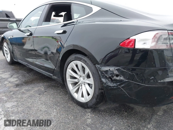 2016 Tesla Model S 70 with VIN 5YJSA1E1XGF154577, listed as a IAAI auction lot 41778697 with 62,630 mi miles and . Bid and sale history available at DreamBid. Image 11.
