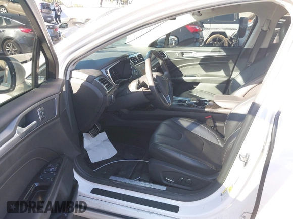 2016 Ford Fusion Titanium Hybrid with VIN 3FA6P0RU1GR259947, listed as a IAAI auction lot 41695377 with 97,605 mi miles. Bid and sale history available at carsss.com. Image 18.