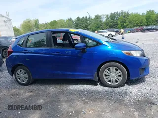 2016 Honda Fit LX z VIN JHMGK5H55GX027913, wystawiony jako IAAI lot #42367857 z przebiegiem 114 776 mil mil oraz . Historia ofert i sprzedaży dostępna na DreamBid. Obrazek 13.