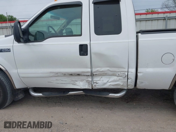 2001 Ford Super Duty F-250 XL with VIN 1FTNX21LX1EA76318, listed as a IAAI auction lot 41878833 with 191,897 mi miles. Bid and sale history available at carsss.com. Image 6.