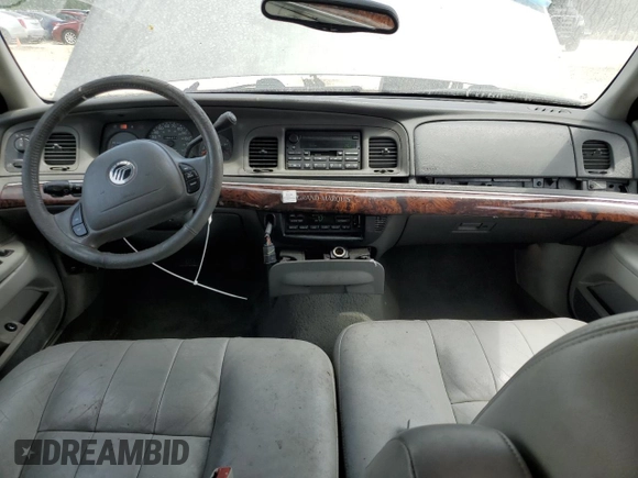 2004 Mercury Grand Marquis LS Premium z VIN 2MEFM75W34X688862, wystawiony jako Copart lot #56801635 z przebiegiem 150 371 mil mil oraz Szkody całkowita. Historia ofert i sprzedaży dostępna na DreamBid. Obrazek 8.