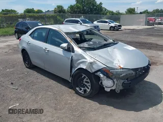 2018 Toyota Corolla L with VIN 2T1BURHE6JC068666, listed as a IAAI auction lot 42715301 with 87,801 mi miles and . Bid and sale history available at DreamBid. Image 1.