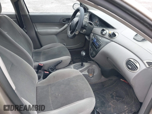 2003 Ford Focus LX with VIN 1FAFP33P33W267575, listed as a IAAI auction lot 41804406 with 106,957 mi miles and . Bid and sale history available at carsss.com. Image 5.