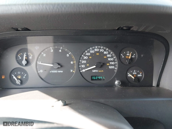 1999 Jeep Grand Cherokee Laredo with VIN 1J4GW58S6XC524451, listed as a IAAI auction lot 41741007 with 162,441 mi miles. Bid and sale history available at carsss.com. Image 7.