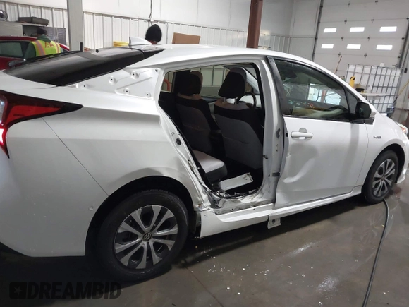 2021 Toyota Prius LE with VIN JTDL9MFU9M3025214, listed as a IAAI auction lot 41375860 with 76,259 mi miles and . Bid and sale history available at DreamBid. Image 6.