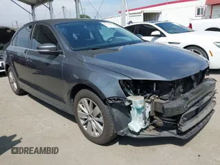 2015 Volkswagen Jetta Sedan 1.8T SE with VIN 3VWD17AJ4FM316616, listed as a IAAI auction lot 42020495 with 120,966 mi miles. Bid and sale history available at carsss.com. Image 1.