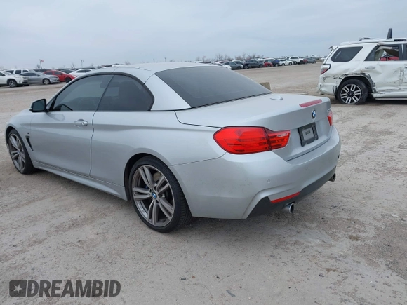 2014 BMW 4 Series 435i z VIN WBA3T3C55EP737428, wystawiony jako IAAI lot #41347382 z przebiegiem 129 513 mil mil oraz . Historia ofert i sprzedaży dostępna na DreamBid. Obrazek 3.