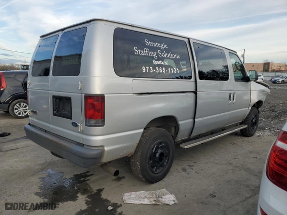 2006 Ford Econoline Wagon XL with VIN 1FBNE31LX6HA77314, listed as a Copart auction lot 82977134 with 0 mi miles and Salvage Title. Bid and sale history available at carsss.com. Image 3.