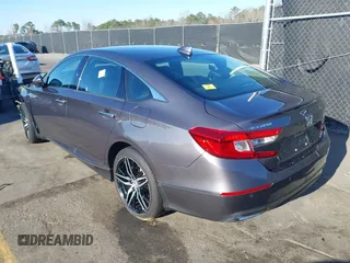 2022 Honda Accord Touring with VIN 1HGCV3F96NA011657, listed as a IAAI auction lot 41701375 with 13,681 mi miles and . Bid and sale history available at DreamBid. Image 3.