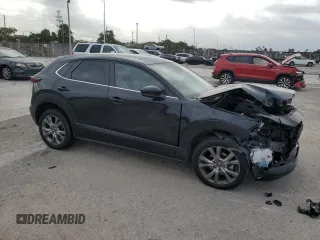 2021 Mazda CX-30 Preferred with VIN 3MVDMACL7MM244487, listed as a Copart auction lot 84307604 with 72,017 mi miles and Salvage Title. Bid and sale history available at DreamBid. Image 4.