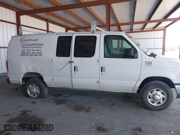 2014 Ford Econoline Cargo Commercial with VIN 1FTNE2EW3EDA31341, listed as a IAAI auction lot 42148317 with 146,158 mi miles and . Bid and sale history available at carsss.com. Image 13.