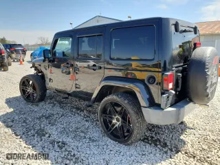 2011 Jeep Wrangler Unlimited Sahara with VIN 1J4HA5H13BL561993, listed as a Copart auction lot 52174355 with 66,092 mi miles and Salvage Title. Bid and sale history available at carsss.com. Image 2.