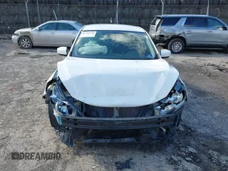 2018 Nissan Sentra S with VIN 3N1AB7AP4JY301321, listed as a IAAI auction lot 41583987 with Not Provided miles and . Bid and sale history available at DreamBid. Image 12.