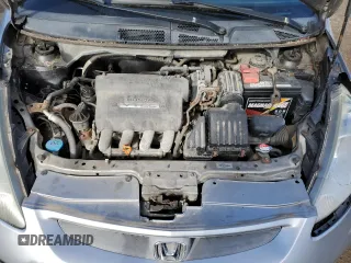 2007 Honda Fit Sport z VIN JHMGD38637S811995, wystawiony jako Copart lot #54436085 z przebiegiem 143 806 mil mil oraz Czysty tytuł • Clean title. Historia ofert i sprzedaży dostępna na DreamBid. Obrazek 11.