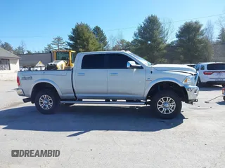 2018 Ram 2500 Laramie z VIN 3C6UR5FL4JG404249, wystawiony jako IAAI lot #41965199 z przebiegiem 123 506 mil mil oraz . Historia ofert i sprzedaży dostępna na DreamBid. Obrazek 13.