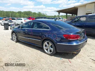 2014 Volkswagen CC R-Line with VIN WVWBP7AN7EE507463, listed as a IAAI auction lot 41984136 with 100,531 mi miles. Bid and sale history available at carsss.com. Image 3.