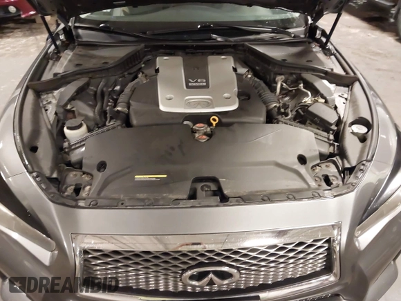 2014 Infiniti Q50 Premium with VIN JN1BV7ARXEM699902, listed as a IAAI auction lot 42135410 with 103,929 mi miles and . Bid and sale history available at DreamBid. Image 10.