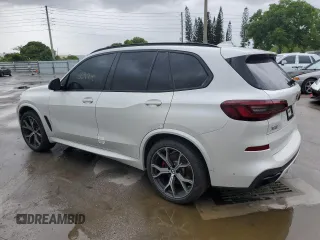 2021 BMW X5 sDrive40i with VIN 5UXCR4C01M9H47230, listed as a Copart auction lot 59798464 with 36,975 mi miles and Salvage title. Bid and sale history available at DreamBid. Image 2.