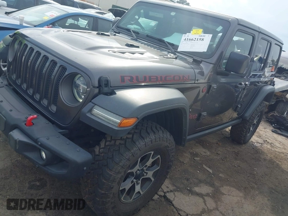 2020 Jeep Wrangler Unlimited Rubicon z VIN 1C4HJXFN8LW176002, wystawiony jako IAAI lot #41662158 z przebiegiem 55 924 mil mil oraz . Historia ofert i sprzedaży dostępna na DreamBid. Obrazek 17.