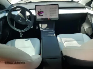 2021 Tesla Model 3 Long Range z VIN 5YJ3E1EB7MF093184, wystawiony jako Copart lot #58060385 z przebiegiem 51 678 mil mil oraz Nie do naprawy • Non repairable. Historia ofert i sprzedaży dostępna na DreamBid. Obrazek 8.