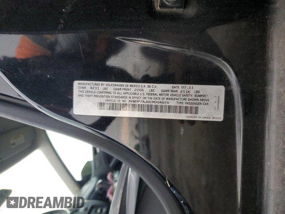 2012 Volkswagen Jetta SE with VIN 3VWDP7AJ0CM304070, listed as a Copart auction lot 60652565 with Not provided miles and Salvage title. Bid and sale history available at DreamBid. Image 12.