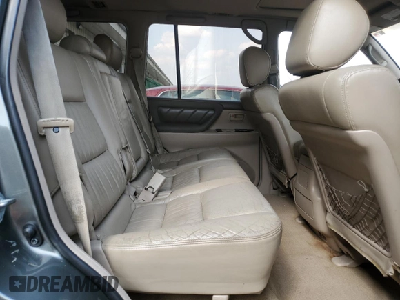 1999 Toyota Land Cruiser z VIN JT3HT05J8X0047612, wystawiony jako Copart lot #60983565 z przebiegiem 390 718 mil mil oraz Czysty tytuł • Clean title. Historia ofert i sprzedaży dostępna na DreamBid. Obrazek 11.