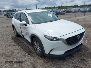 2016 Mazda CX-9 Sport with VIN JM3TCABY4G0100620, listed as a IAAI auction lot 42316216 with 191,245 mi miles and . Bid and sale history available at DreamBid. Image 1.
