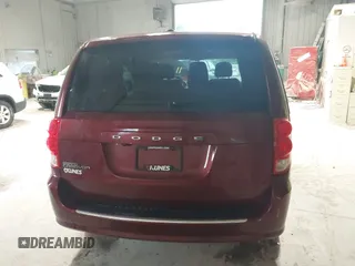 2017 Dodge Grand Caravan SE z VIN 2C4RDGBG7HR865810, wystawiony jako IAAI lot #42414604 z przebiegiem 116 642 mil mil oraz . Historia ofert i sprzedaży dostępna na DreamBid. Obrazek 16.
