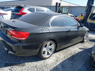 2010 BMW 3 Series 335i with VIN WBAWL7C56AP476194, listed as a IAAI auction lot 41397024 with 69,346 mi miles. Bid and sale history available at carsss.com. Image 4.