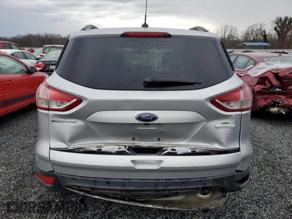 2015 Ford Escape SE with VIN 1FMCU0GX8FUB55610, listed as a Copart auction lot 48484695 with 138,687 mi miles and Salvage Title. Bid and sale history available at DreamBid. Image 6.