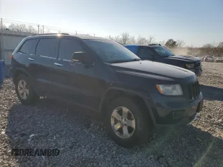 2013 Jeep Grand Cherokee Overland with VIN 1C4RJFCT8DC523252, listed as a Copart auction lot 48706965 with 173,325 mi miles and Salvage Title. Bid and sale history available at carsss.com. Image 4.