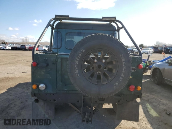1999 Land Rover Defender with VIN SALLDHM87YA180832, listed as a Copart auction lot 49849015 with Not provided miles and Clean title. Bid and sale history available at DreamBid. Image 6.
