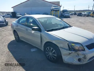 2008 Mitsubishi Galant ES z VIN 4A3AB36FX8E029402, wystawiony jako IAAI lot #41875291 z przebiegiem 101 021 mil mil oraz . Historia ofert i sprzedaży dostępna na DreamBid. Obrazek 13.