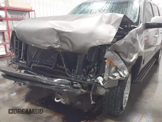2014 GMC Yukon XL SLT with VIN 1GKS2KE76ER166776, listed as a IAAI auction lot 41056887 with 206,773 mi miles. Bid and sale history available at carsss.com. Image 6.