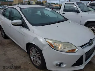2012 Ford Focus SEL with VIN 1FAHP3H27CL387869, listed as a IAAI auction lot 41976528 with 106,927 mi miles. Bid and sale history available at carsss.com. Image 6.