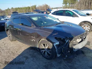 2016 Nissan Maxima Platinum with VIN 1N4AA6AP4GC434534, listed as a IAAI auction lot 41642540 with 143,413 mi miles and . Bid and sale history available at DreamBid. Image 1.