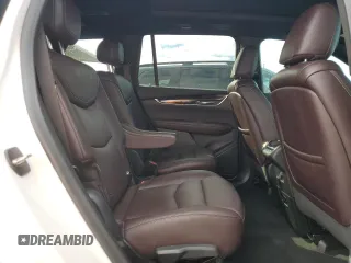 2021 Cadillac XT6 Premium Luxury z VIN 1GYKPCRSXMZ230618, wystawiony jako Copart lot #81022824 z przebiegiem Nie podano mil oraz Szkoda całkowita • Salvage title. Historia ofert i sprzedaży dostępna na DreamBid. Obrazek 11.