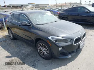 2019 BMW X2 sDrive28i with VIN WBXYJ3C58KEP77334, listed as a IAAI auction lot 42575165 with 98,910 mi miles and . Bid and sale history available at DreamBid. Image 1.