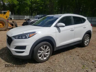 2019 Hyundai Tucson Value z VIN KM8J33A41KU991490, wystawiony jako Copart lot #52636385 z przebiegiem 92 615 mil mil oraz Szkoda całkowita • Salvage title. Historia ofert i sprzedaży dostępna na DreamBid. Obrazek 1.