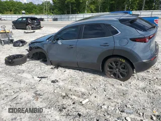 2023 Mazda CX-30 S Carbon Edition с VIN 3MVDMBCM9PM517237, выставлен на аукционе Copart как лот 55773945 с пробегом 17 724 миль миль и Списание • Salvage title. История ставок и продаж доступна на DreamBid. Изображение 2.